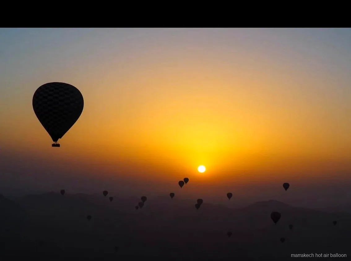 Sunset light over the mountains during a Marrakech paragliding flight