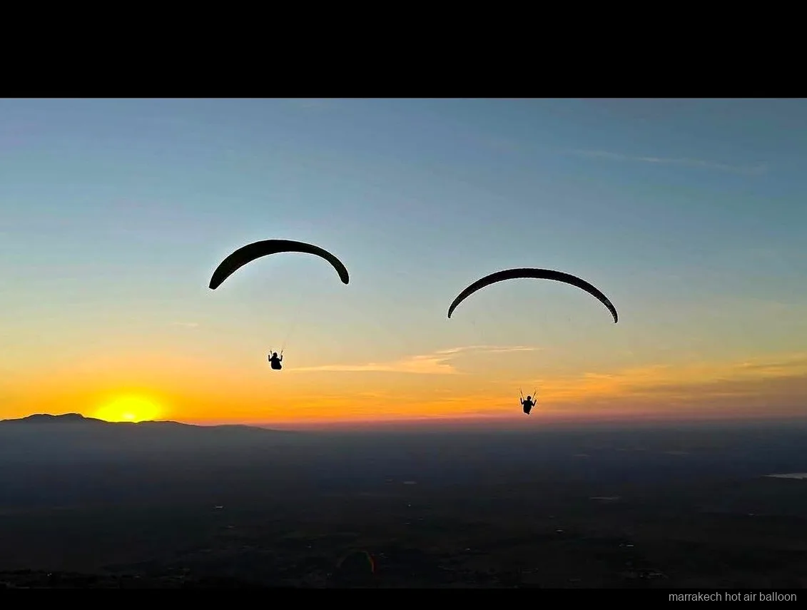 Pilot preparing a tandem paragliding flight near Marrakech